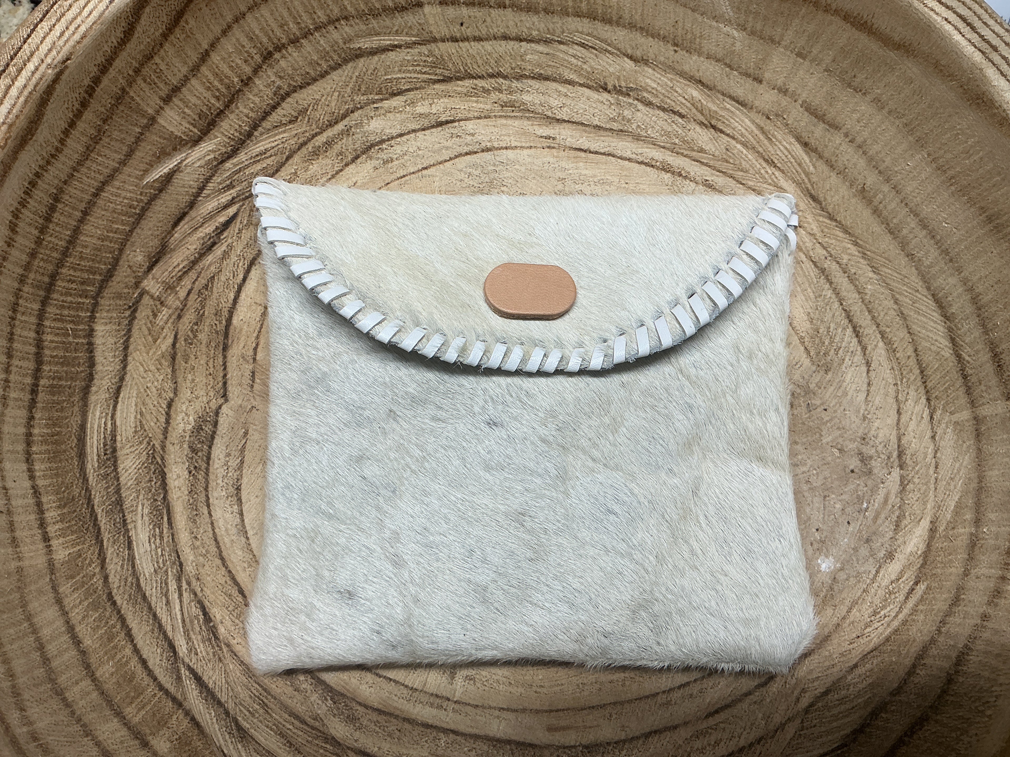 Cowhide pouch bag