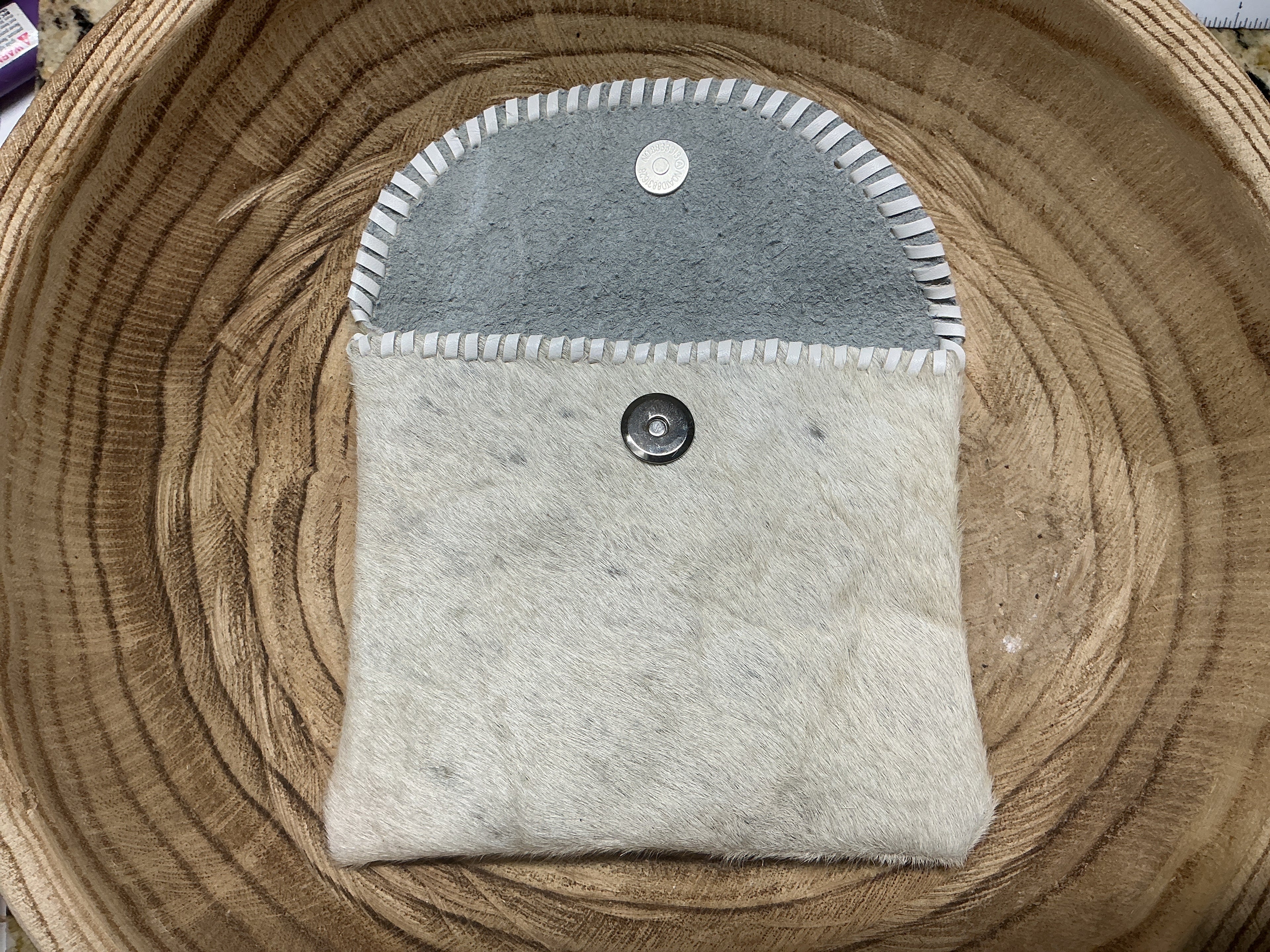 Cowhide pouch bag