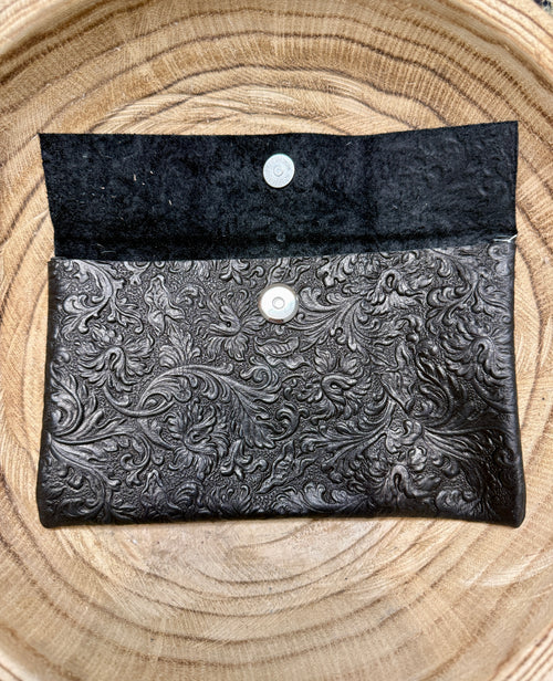 Black textured pouch bag