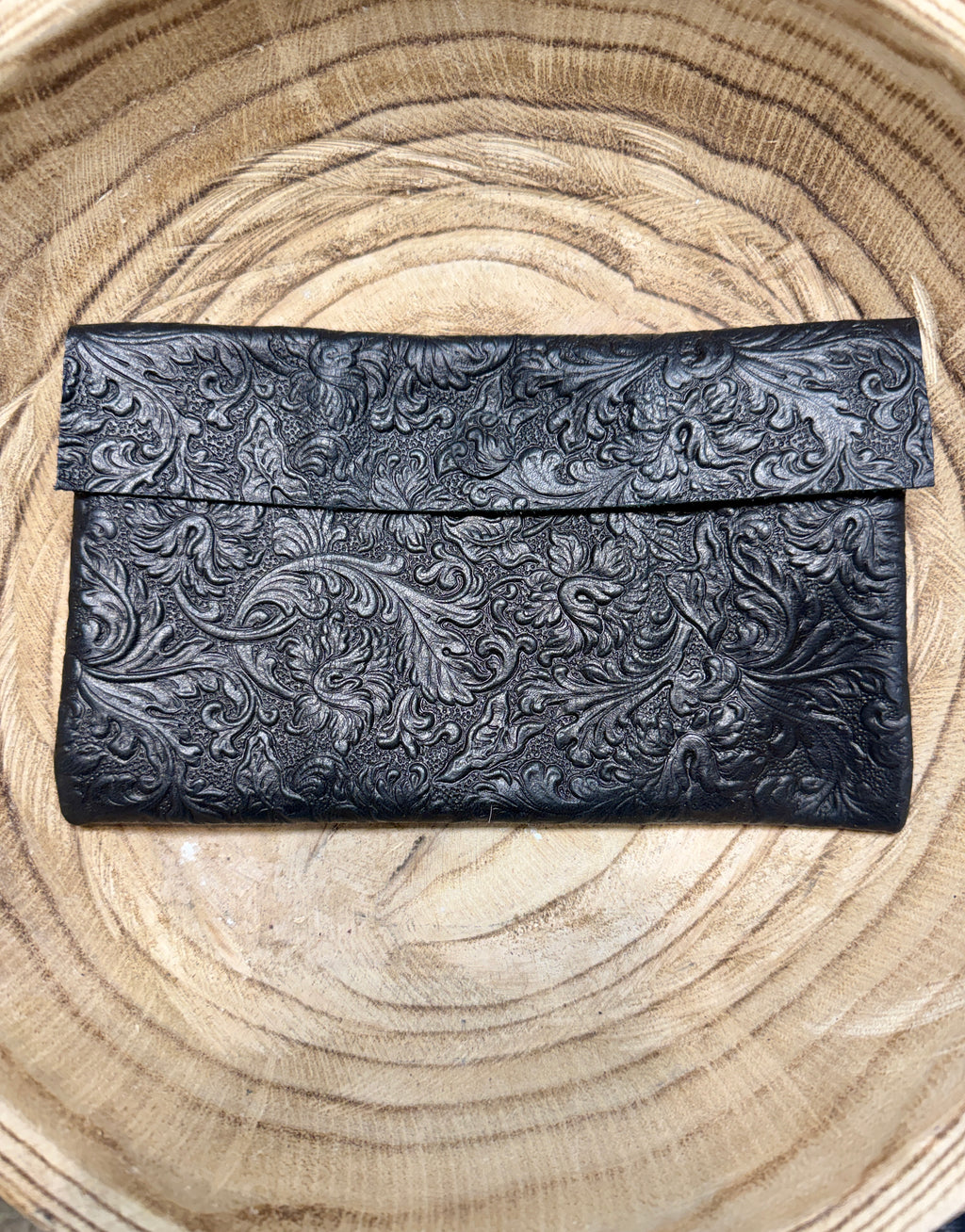 Black textured pouch bag