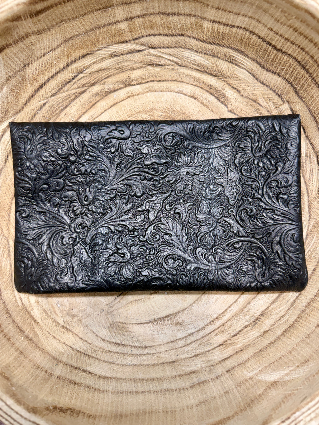 Black textured pouch bag