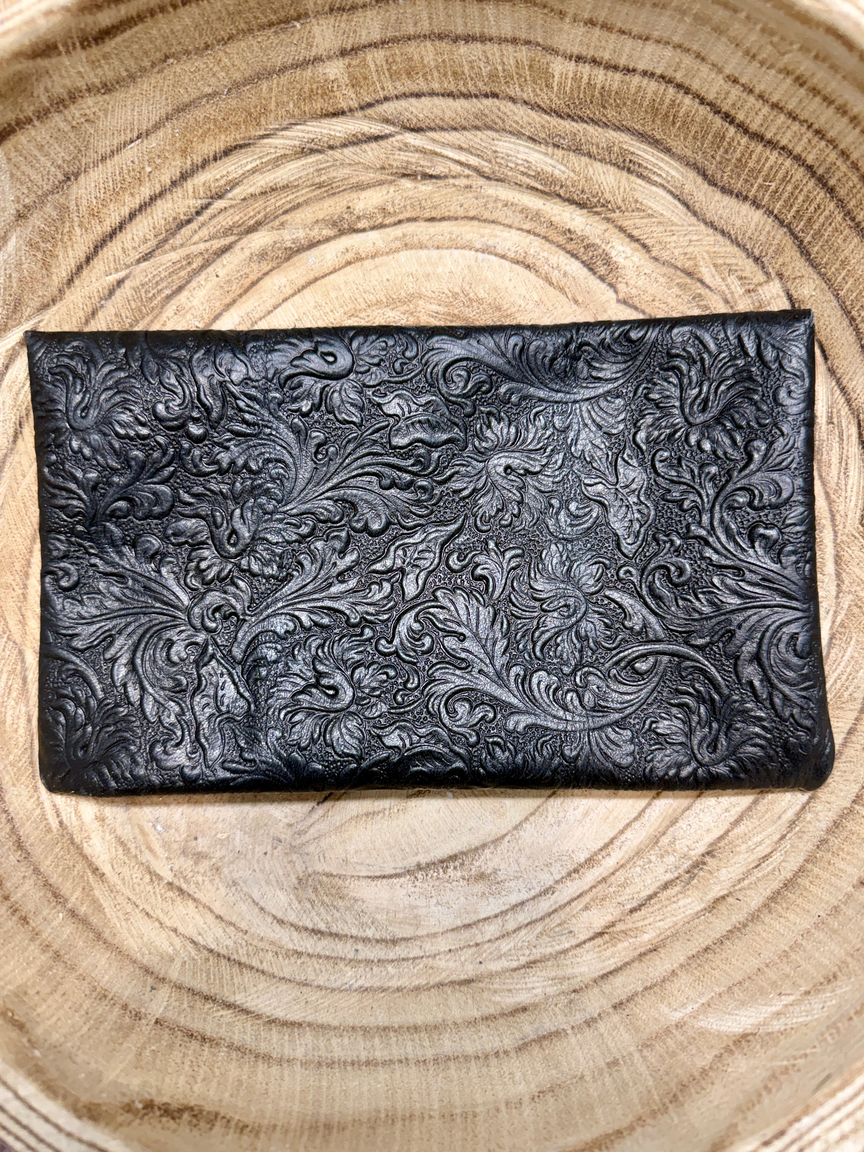 Black textured pouch bag