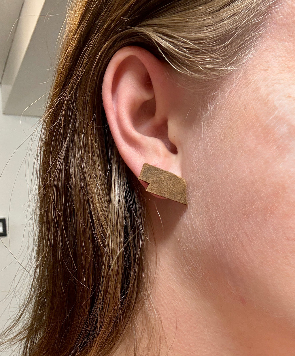 Husker earrings 2