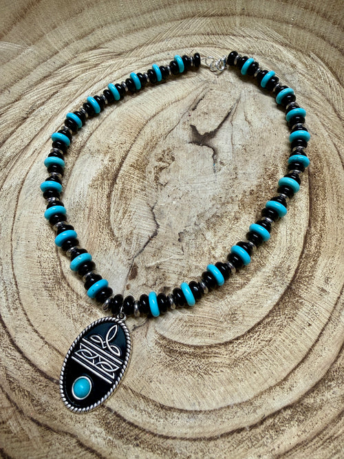 Boot Stitch necklace